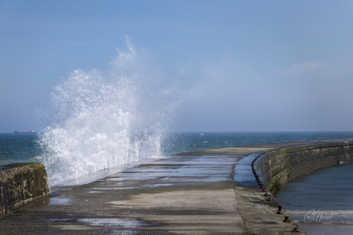 Waves breaking over Seaham Harbour Wall Durham